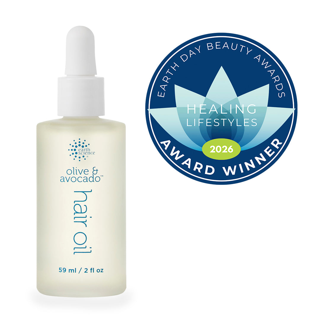 Bottle of olive and avocado hair oil with Earth Day Beauty Awards 2026 Healing Lifestyles Award Winner badge on a white background.