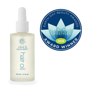 Bottle of olive and avocado hair oil with Earth Day Beauty Awards 2026 Healing Lifestyles Award Winner badge on a white background.